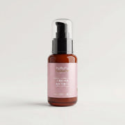 Flaconul Cremei Antirid cu rodie și ulei de argan, Natural Beauty by Laura Baldini, pe fundal neutru.