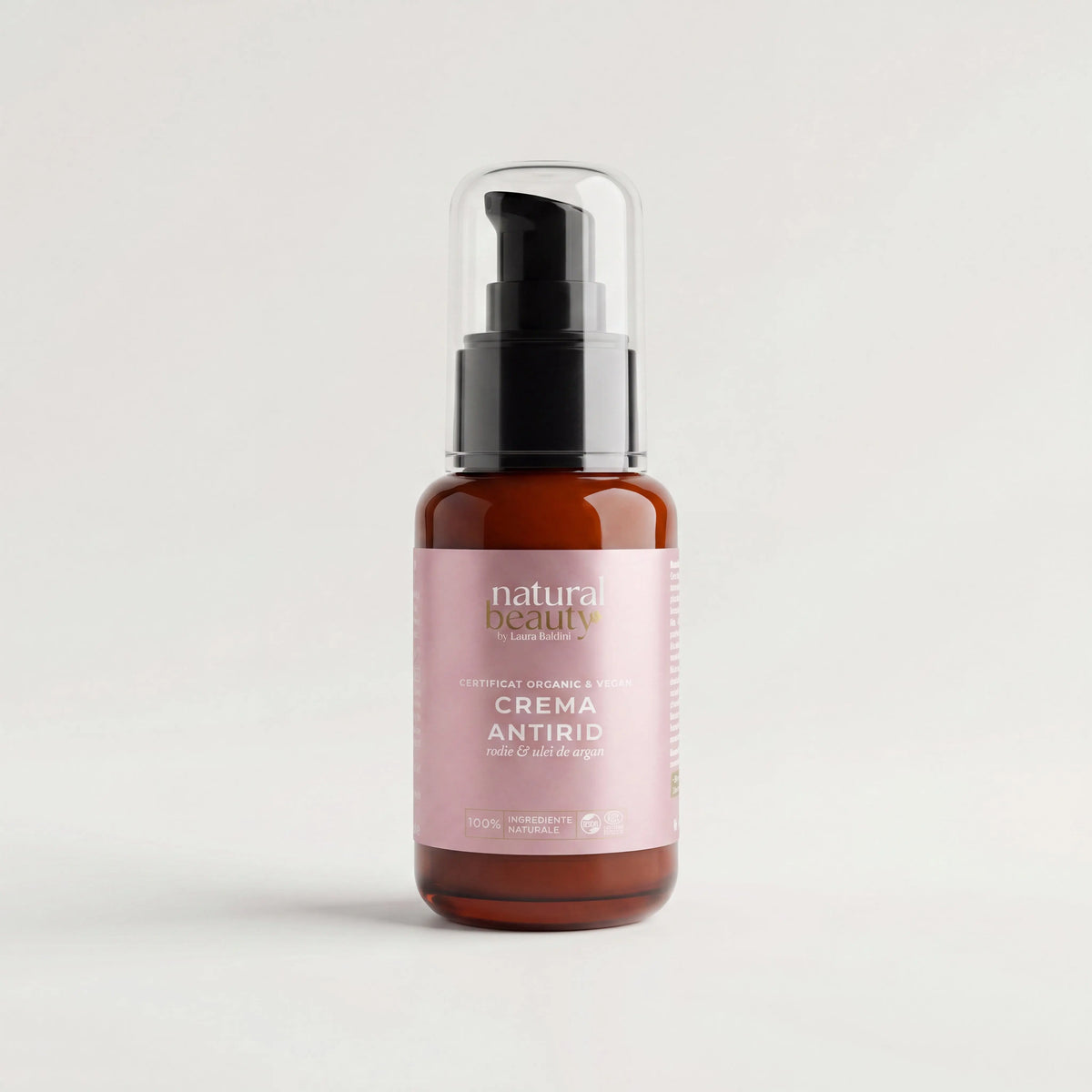Flaconul Cremei Antirid cu rodie și ulei de argan, Natural Beauty by Laura Baldini, pe fundal neutru.