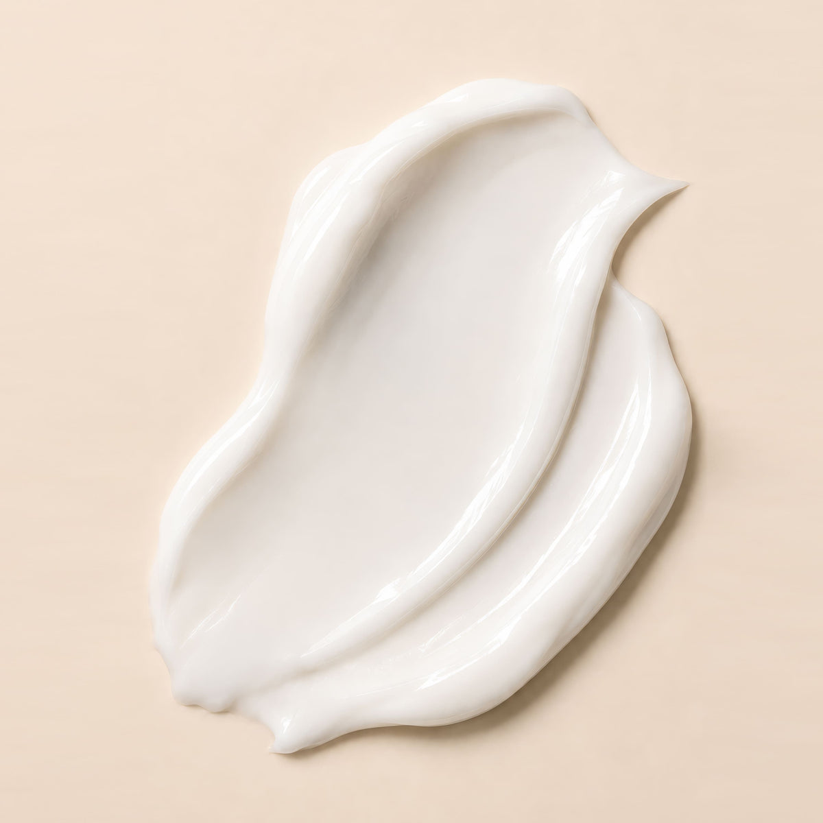 Textură albă și cremoasă, în valuri, arată consistența Cremei de Mâini Hidratante Natural Beauty by Laura Baldini